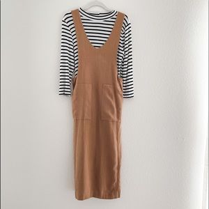 Tan Roolee jumper with black and white shirt